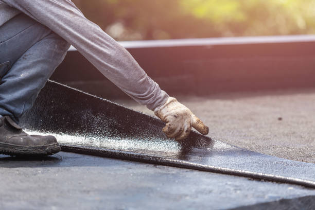 Professional Basement Waterproofing technician working in Wapakoneta, OH
